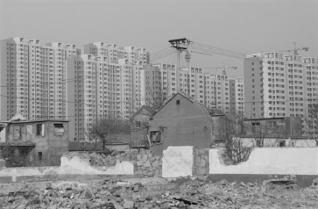 城镇化成地方两会热议话题农民住楼更需融入城市