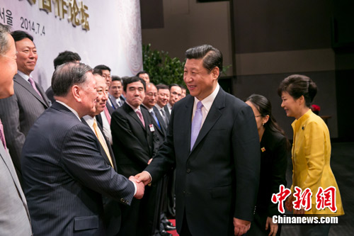 习近平勉励中韩企业家:携手合作,共创未来